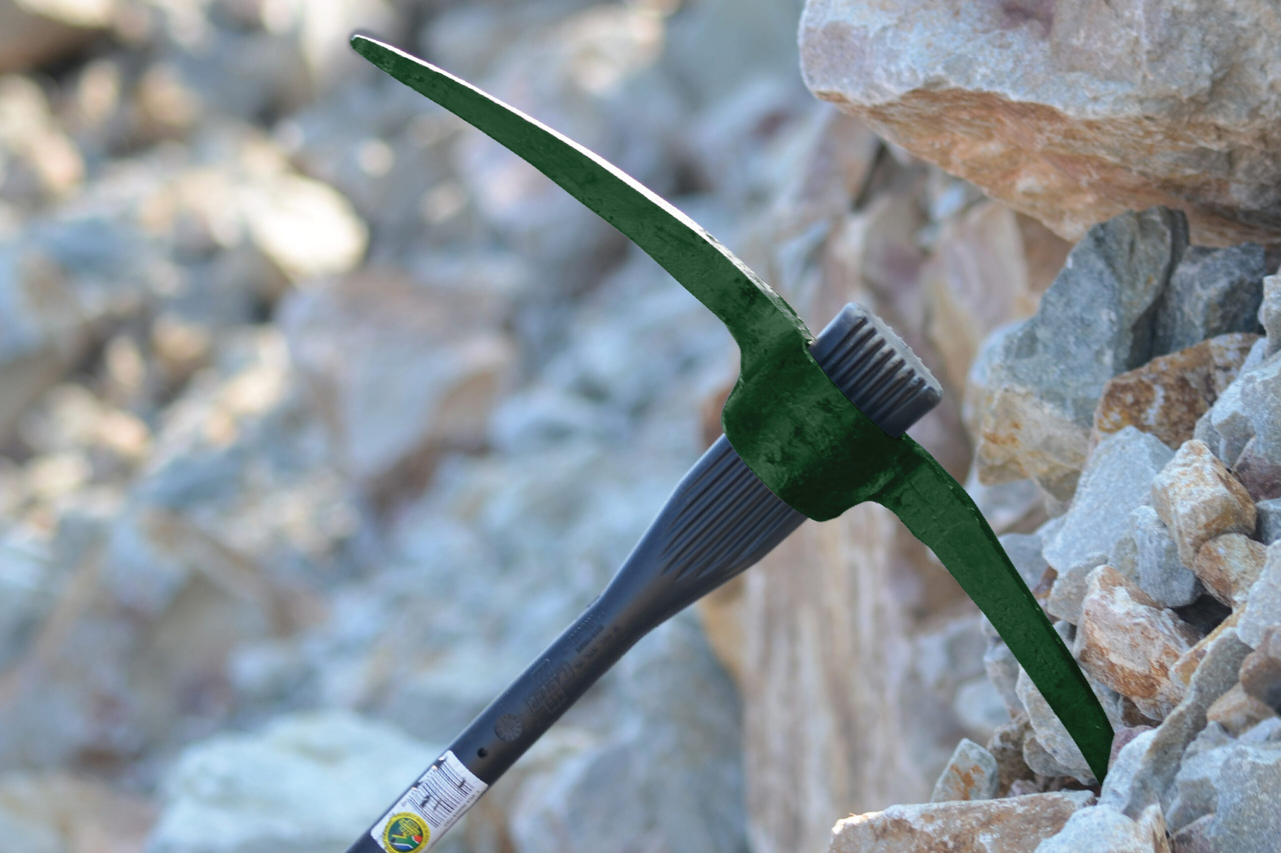 Mining sector image of a pick axe in a mine